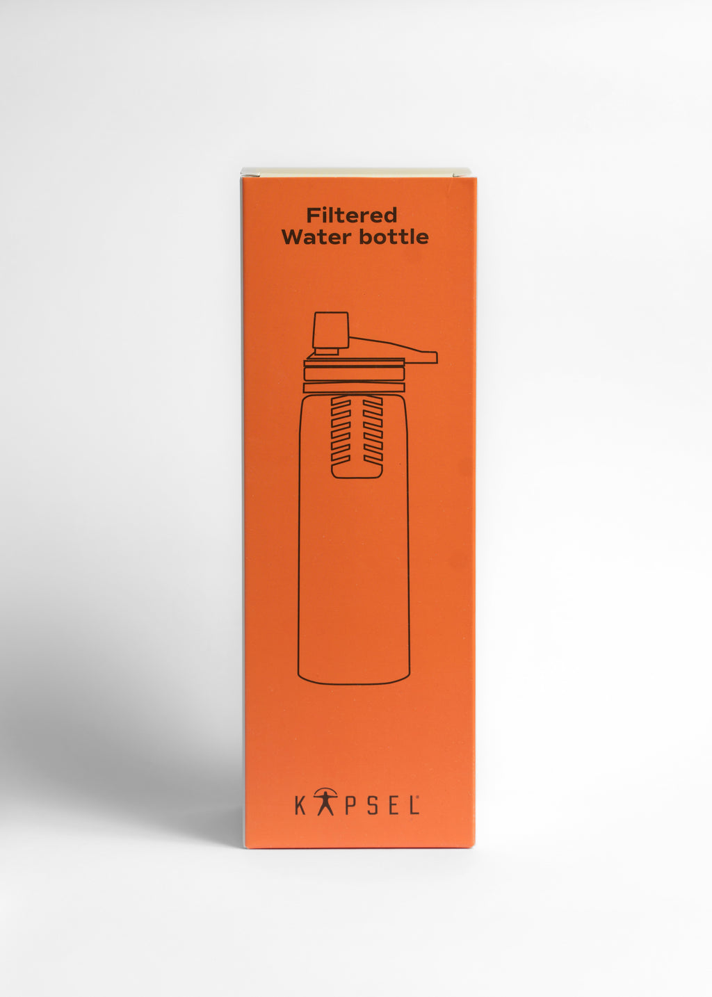 Orange box packaging of a filtered water bottle with 'KAPSEL' branding on a white background