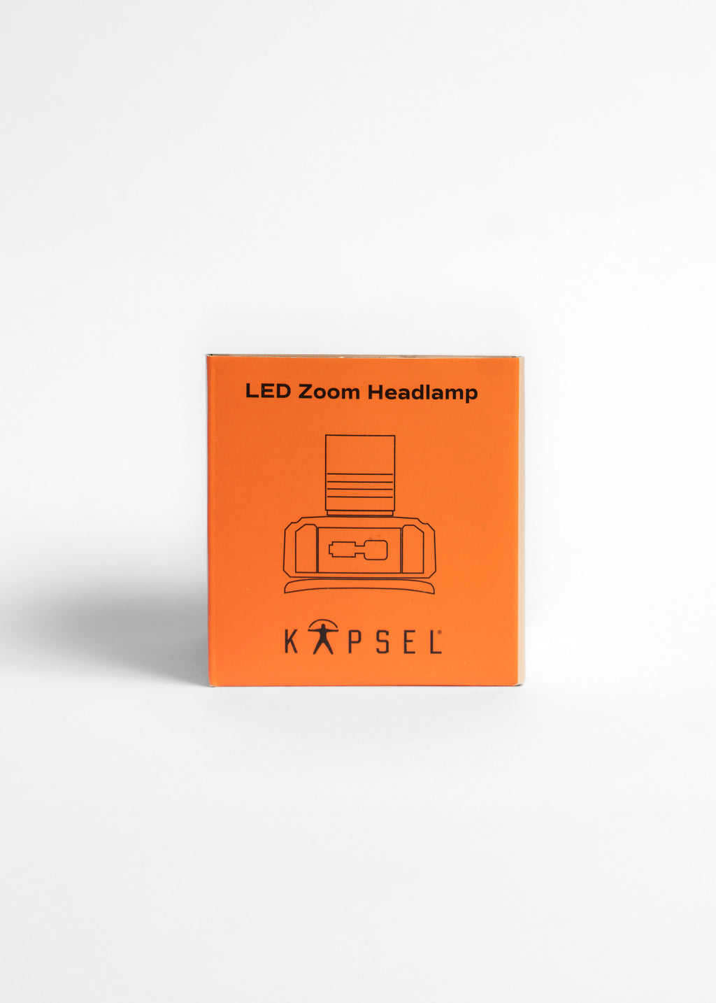 Orange packaging of a LED Zoom Headlamp with Kapsel branding on a white background