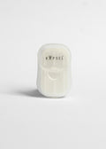 White paper soap with 'KAPSEL' branding on a light gray background