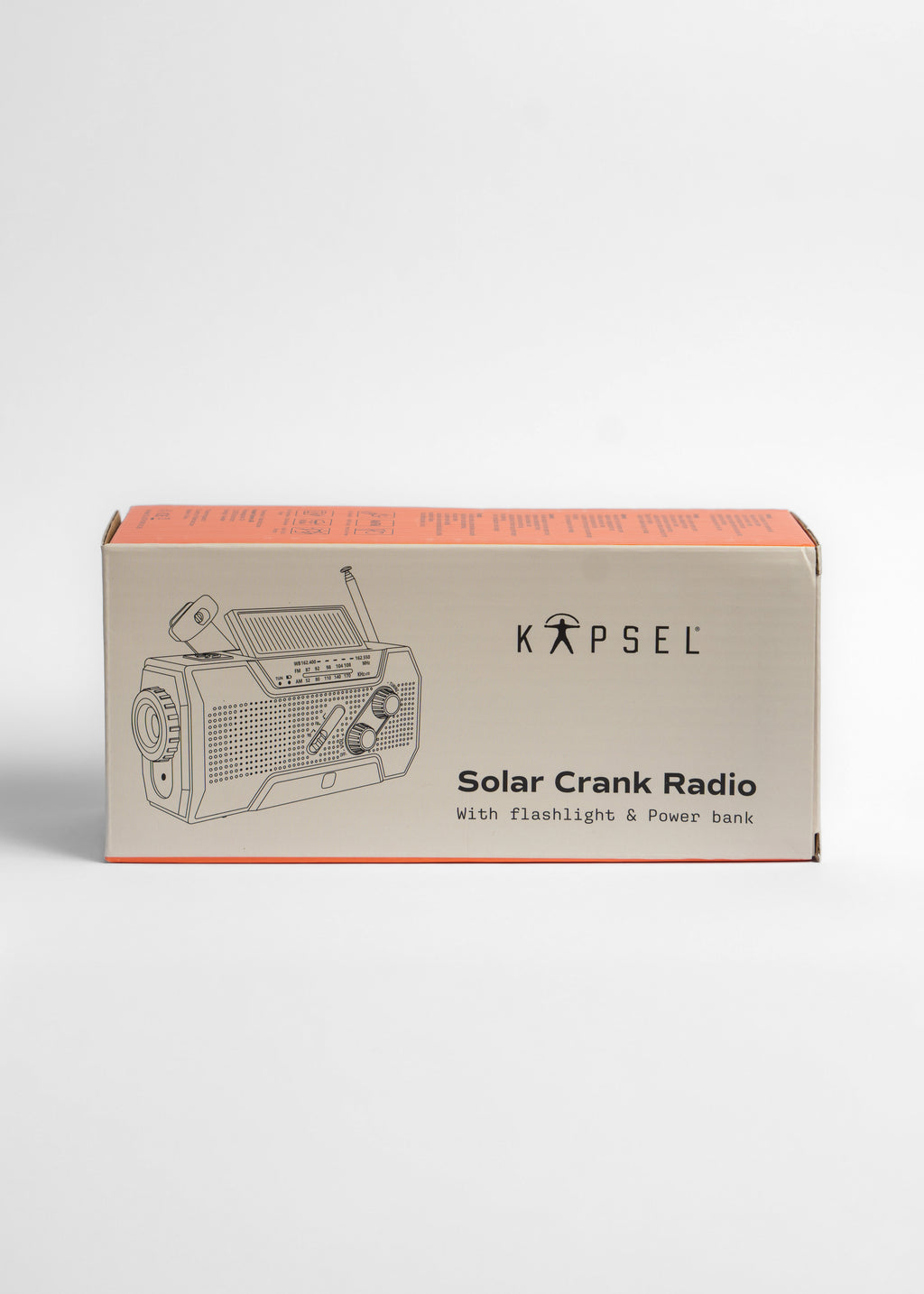 Kapsel Solar Crank Radio packaging on a white background