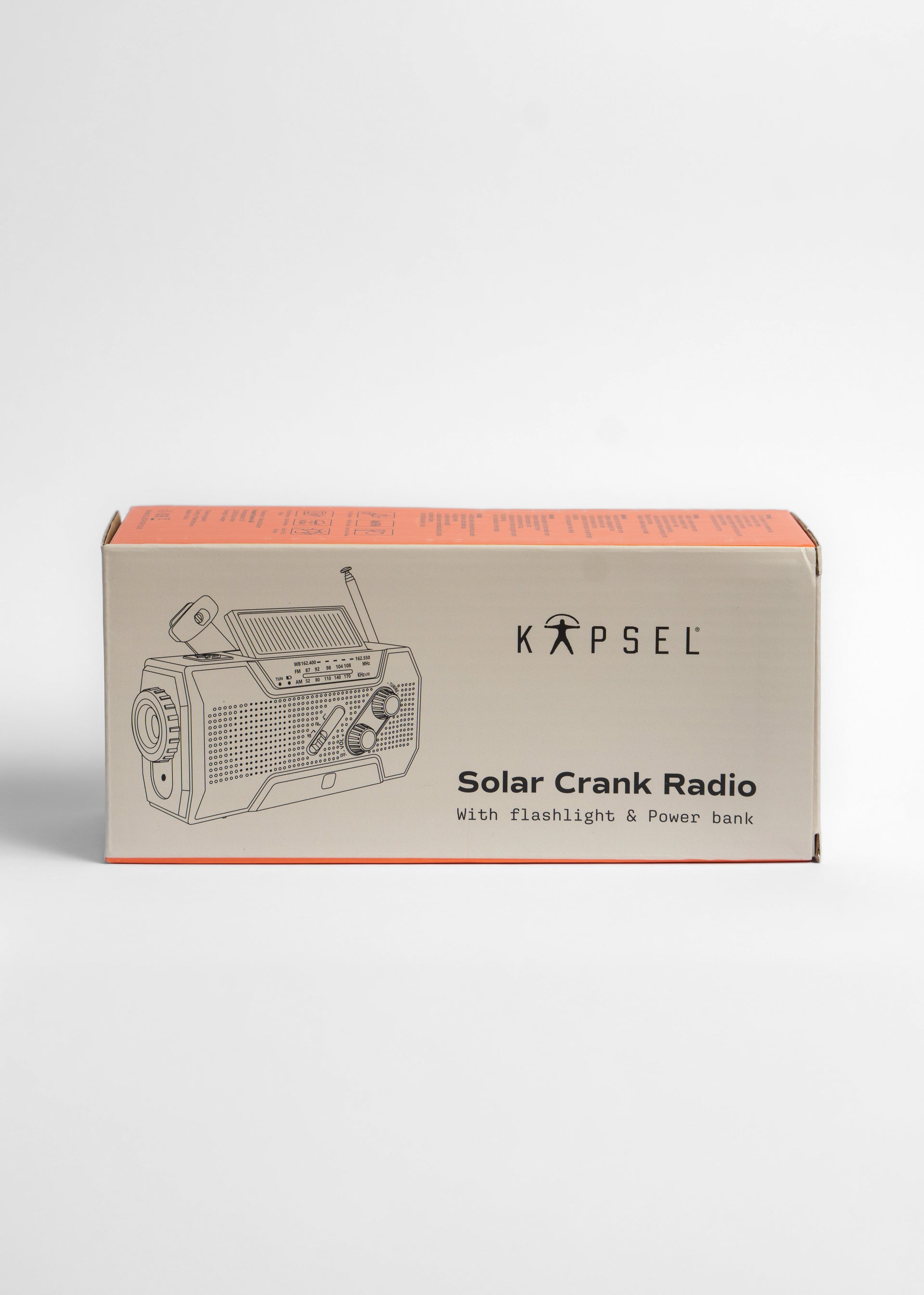 Kapsel Solar Crank Radio packaging on a white background