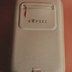 Film: the Kapsel Core system bag and capsules opened, one capsule at a time