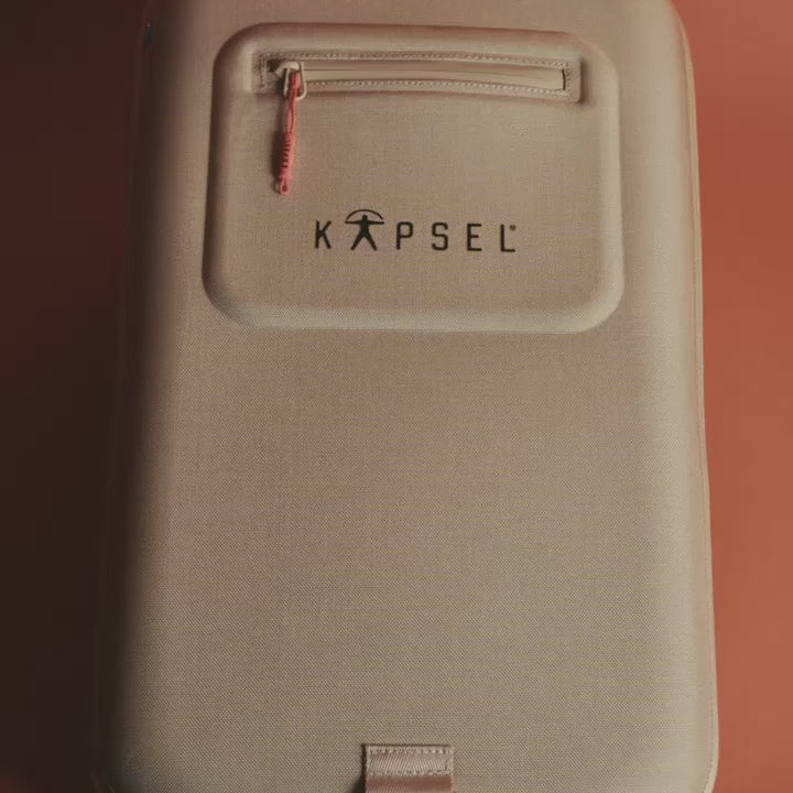 Film: the Kapsel Core system bag and capsules opened, one capsule at a time